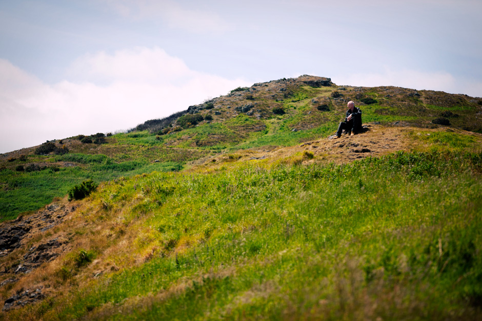sitting on a mountain